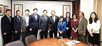 Professor Rocky Tuan (middle) of CUHK receives the delegation from PKU led by their President